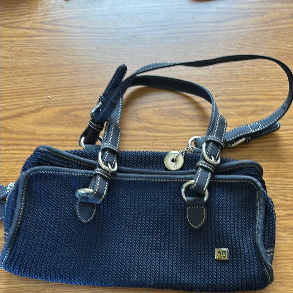 Navy Knot Shoulder Bag with Silver Hardware. The Sak